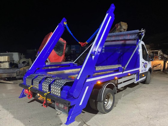 mini skip loader transit 